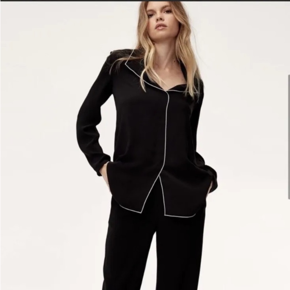 Aritzia Babaton Rena black blouse with white trim in size S (orig $125)